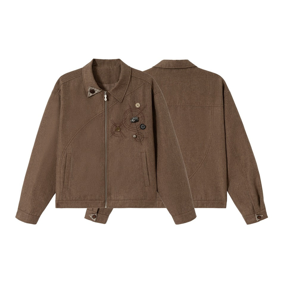 Brown collared zip-front jacket shown from the front and back, with curved seam details and chest embellishments.