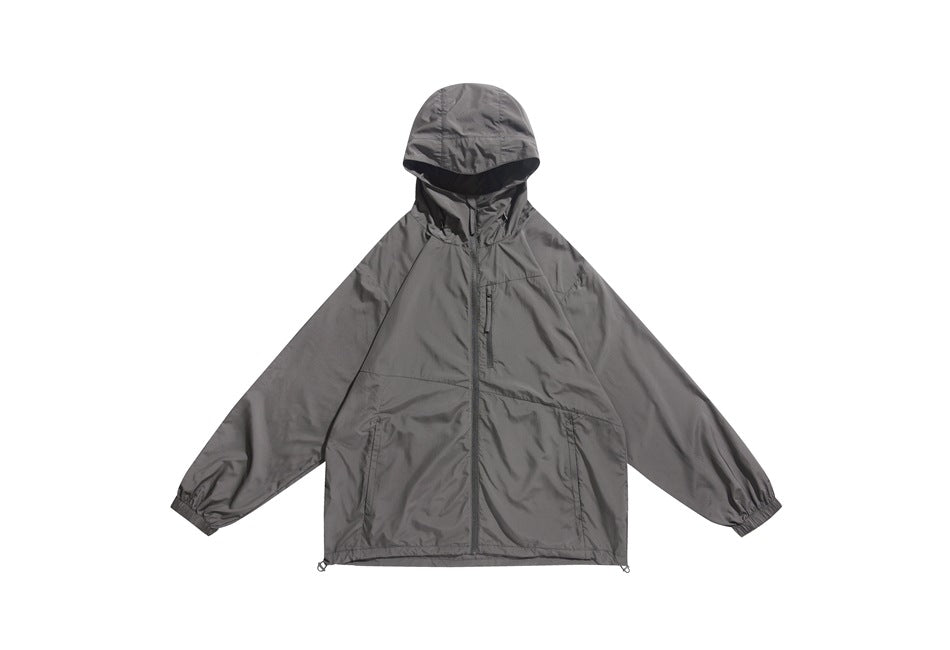 Front view of a gray hooded jacket with a full-length zipper, two zip pockets, elastic cuffs, and an adjustable hem.