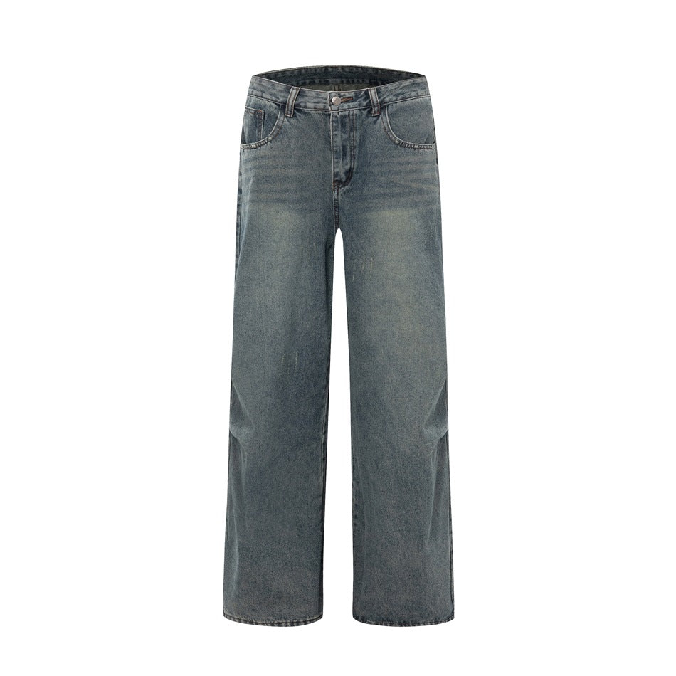 Light blue vintage-wash wide-leg jeans flat lay, front view, with faded whiskering and belt loops