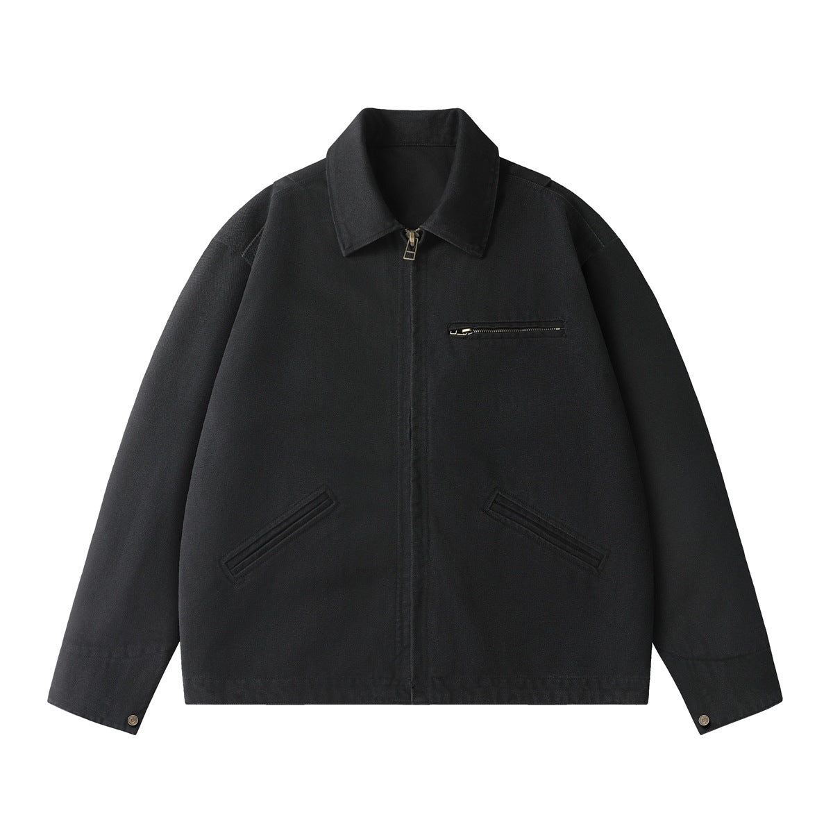 Black zip-front work jacket with pointed collar, zip chest pocket, slanted hip pockets and cuff button tabs, flat lay