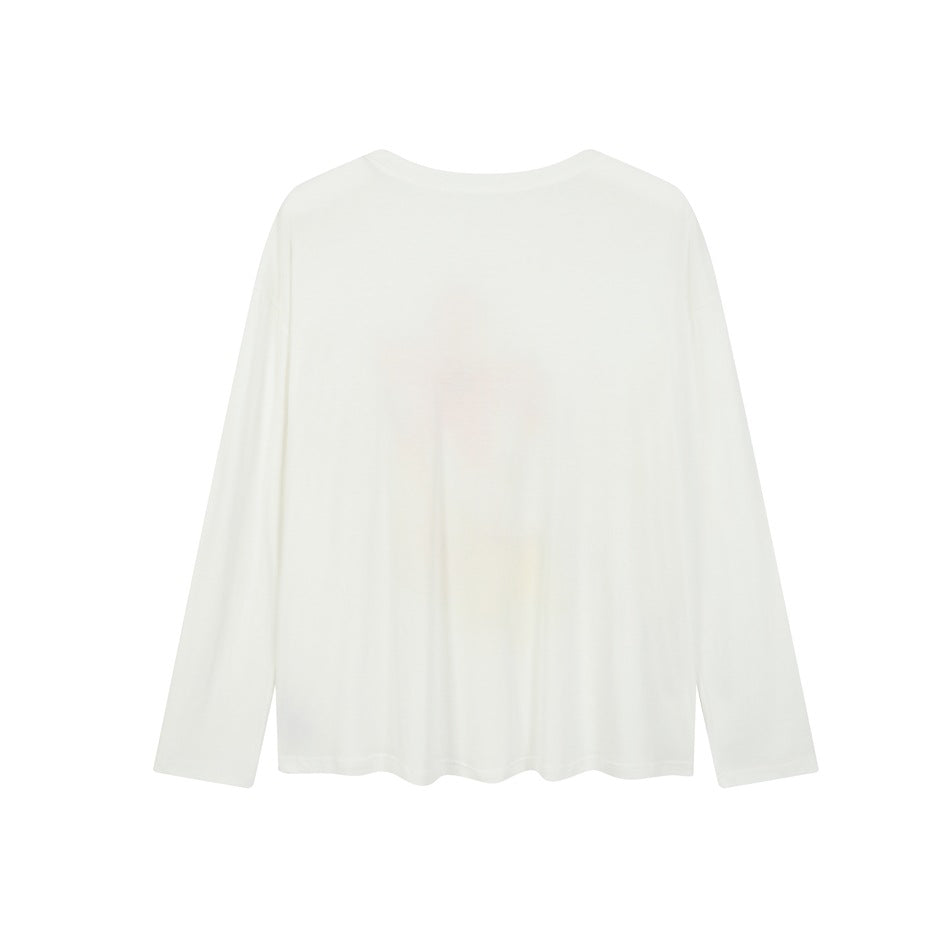 Back view of an off-white long-sleeve crew neck top with a plain back and faint print show-through