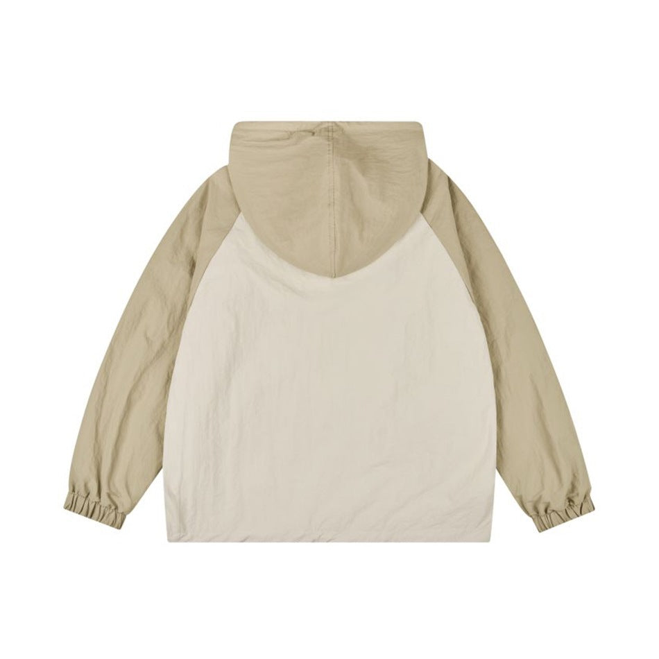 Back view of a cream pullover jacket with beige raglan sleeves and hood.