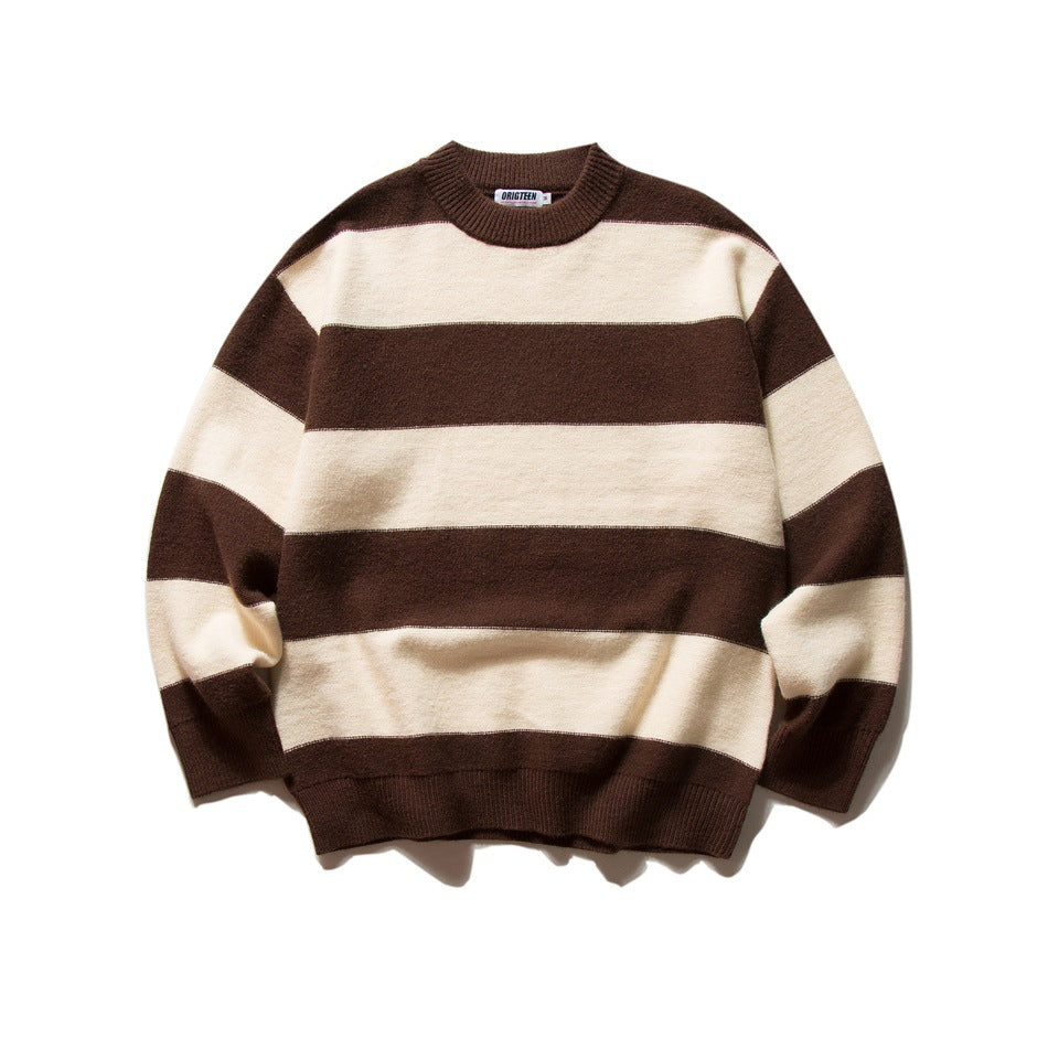 Brown and cream wide-striped knit crewneck sweater laid flat, front view