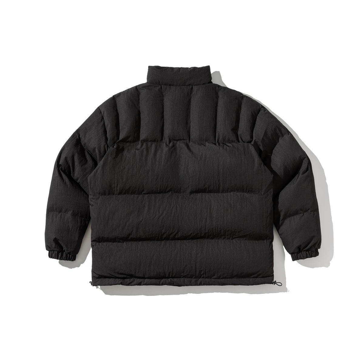 Back view of a black padded jacket with a high collar, long sleeves, and horizontal baffles.