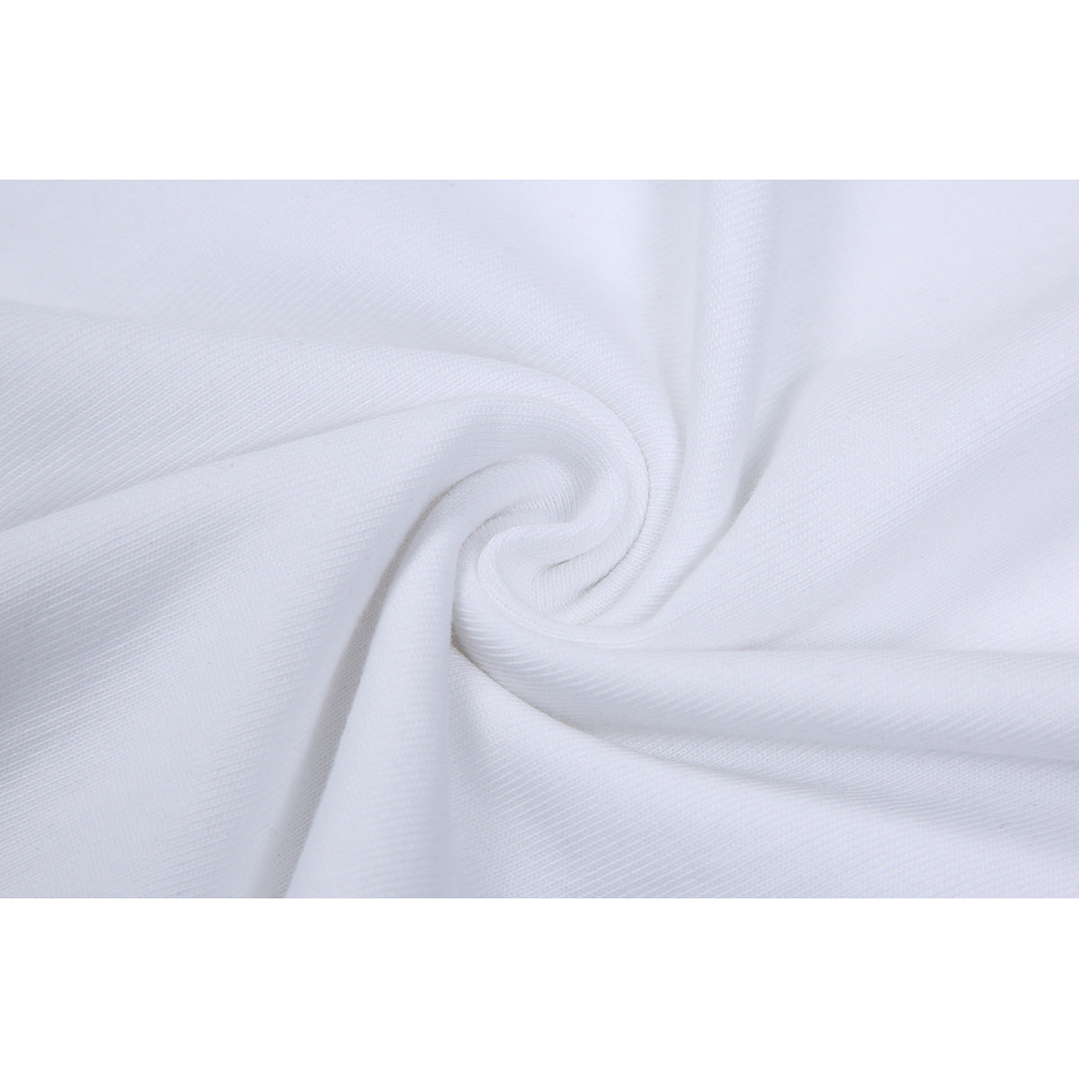 Close-up of white fabric gathered into a swirl, showing its fine textured surface.