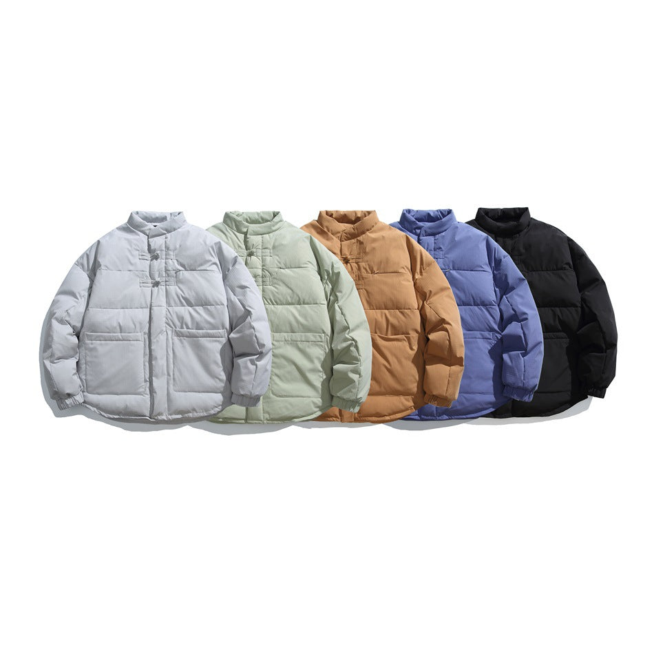 Five front-facing padded jackets in light gray, pale sage, tan, blue and black.