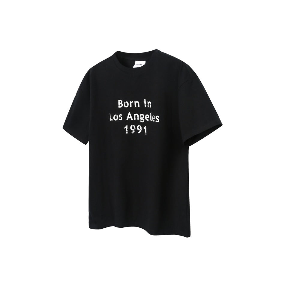 Black short-sleeve crewneck T-shirt with white distressed 'Born in Los Angeles 1991' chest print