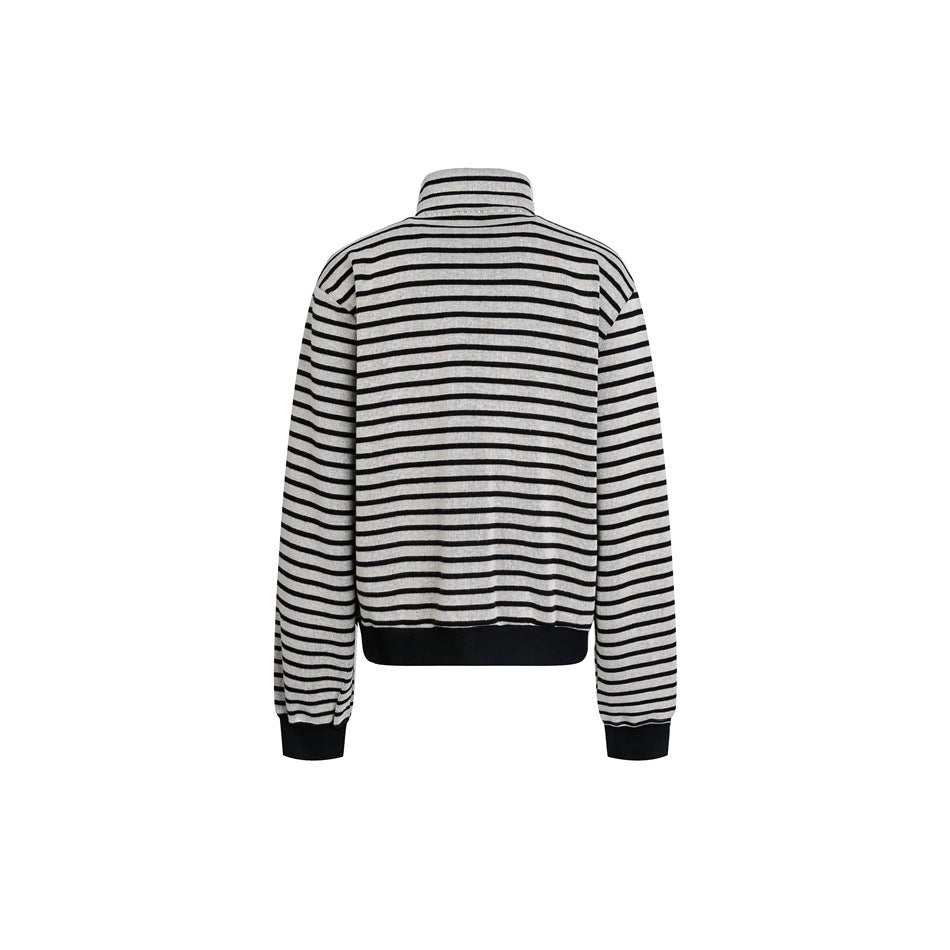 Back view of a light gray jacket with thin black horizontal stripes, a high collar, and black ribbed cuffs and hem.