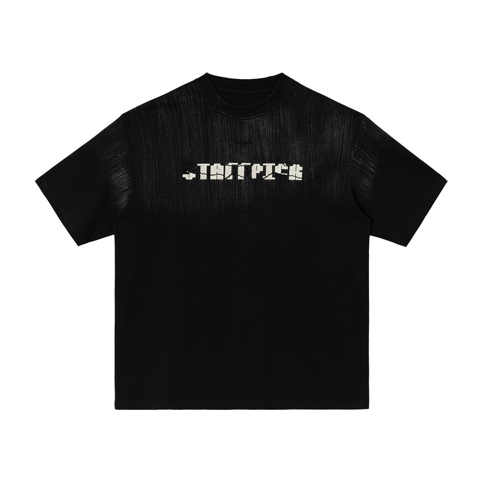 Black short-sleeve crew-neck T-shirt with brushed streak finish and pixel-style chest logo, flat lay