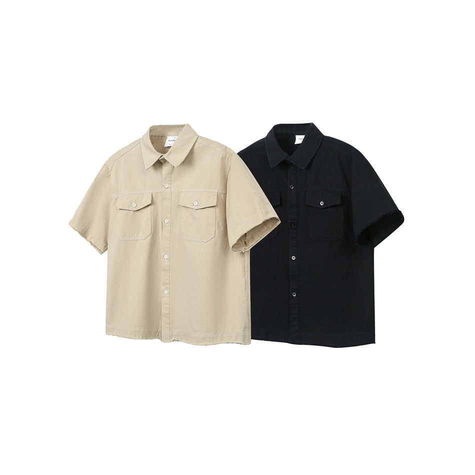 Beige and black short-sleeve button-up shirts with pointed collars and two buttoned chest pockets, shown from the front.