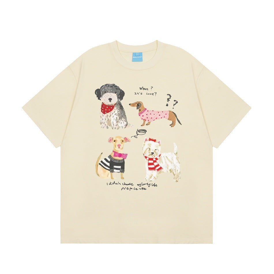 Apricot short-sleeve crew-neck T-shirt with a front print of four illustrated dogs and handwritten-style text
