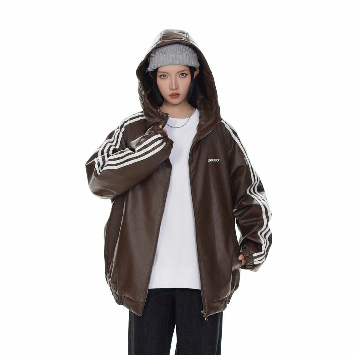 Model wearing a dark brown hooded zip jacket with white sleeve stripes.