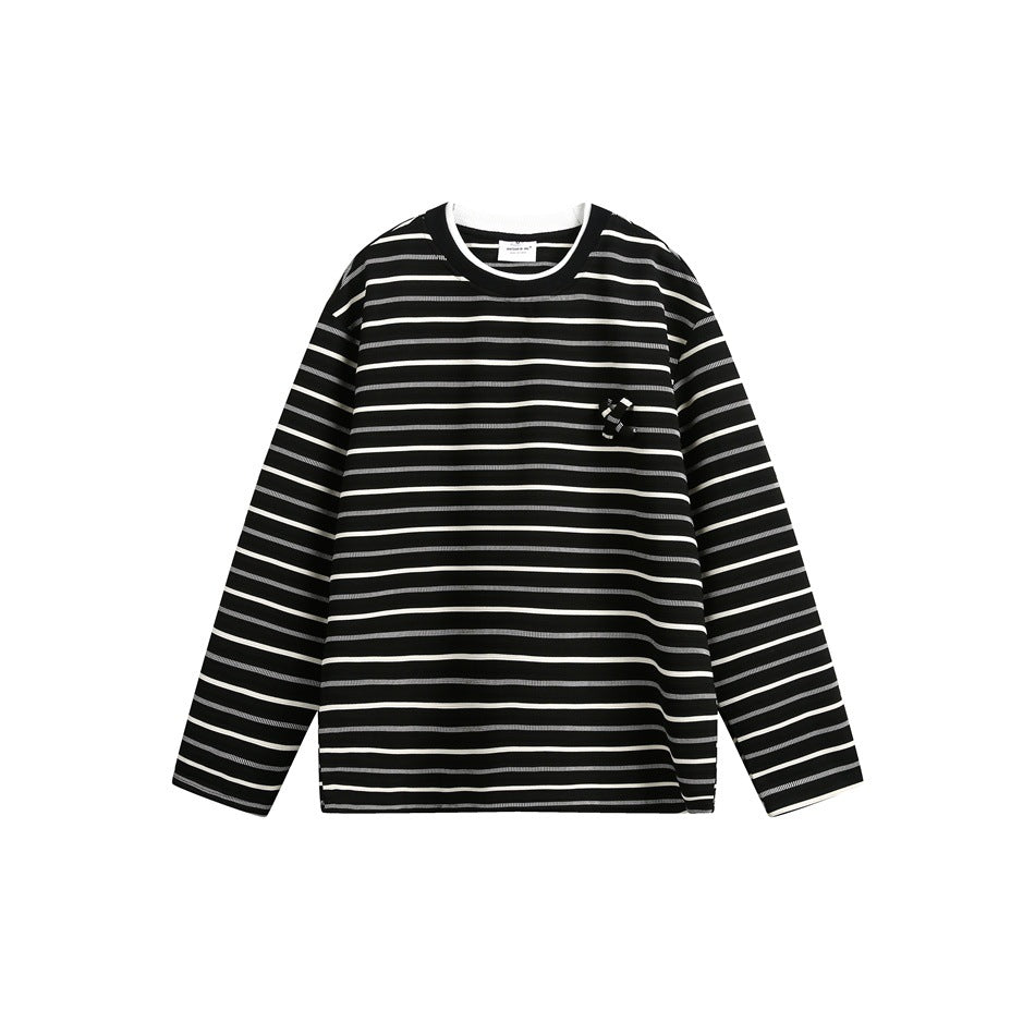 Black crew neck long-sleeve top with white and gray horizontal stripes and a small knotted detail on the chest