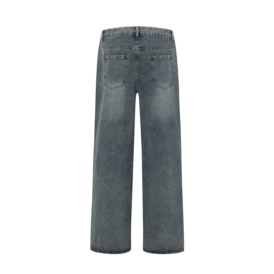 Back view of faded blue wide-leg jeans laid flat, showing the waistband and two rear pockets.
