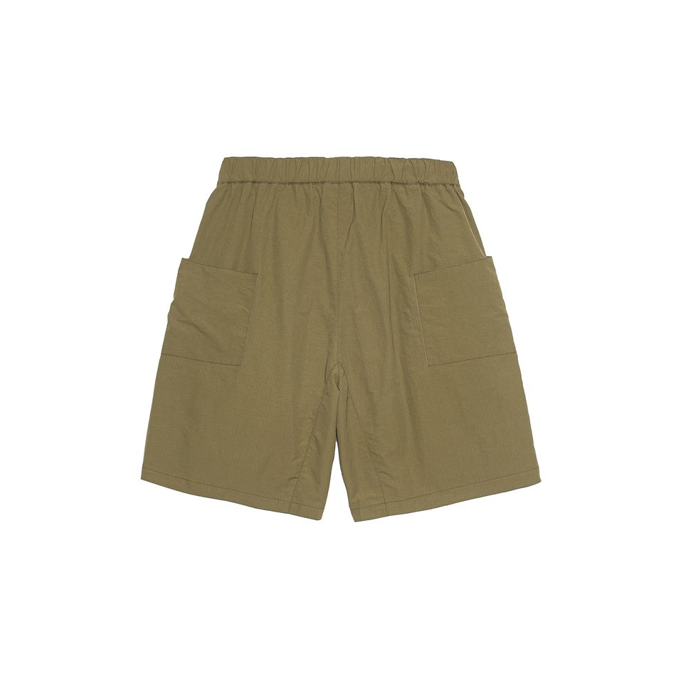 Back view of olive-brown shorts with elastic waistband and two large patch pockets