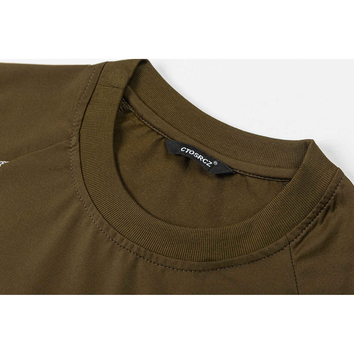 Close-up of an olive-brown T-shirt's ribbed crew neck and sewn-in black label.