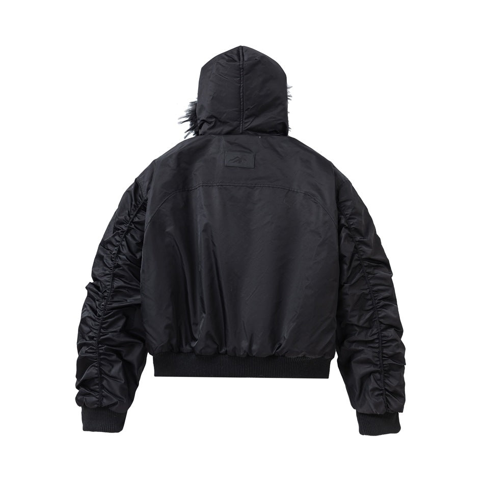 Back view of a black hooded jacket with gathered sleeves and ribbed cuffs and hem.