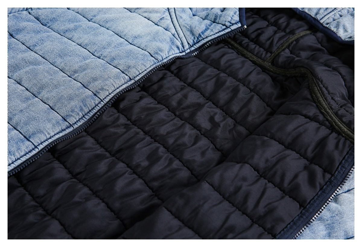 Open light blue quilted jacket showing its dark navy quilted interior lining.