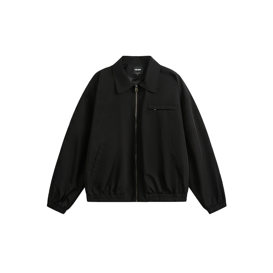 Black collared zip-up jacket flat lay with chest zip pocket, side pockets and elastic cuffs and hem