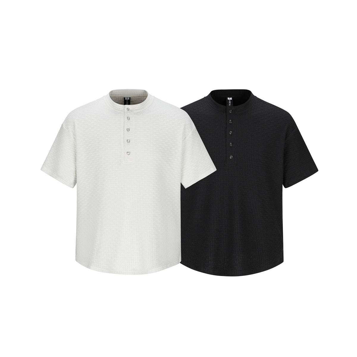 Two short-sleeve textured shirts shown from the front in white and black, each with a stand collar and button placket.