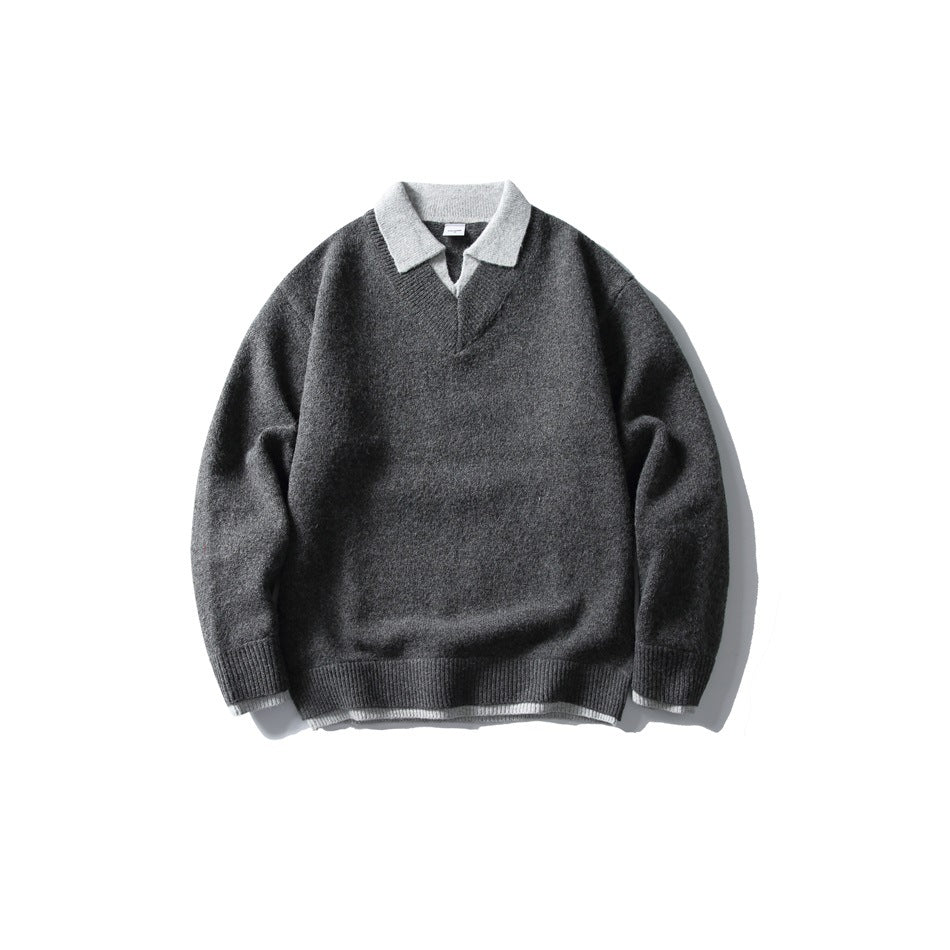 Dark gray V-neck knit sweater with light gray polo collar and layered hem, flat lay front view