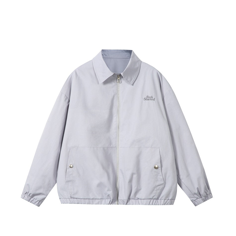 Light blue zip-front collared jacket flat lay with snap-button front pockets, elastic cuffs and hem