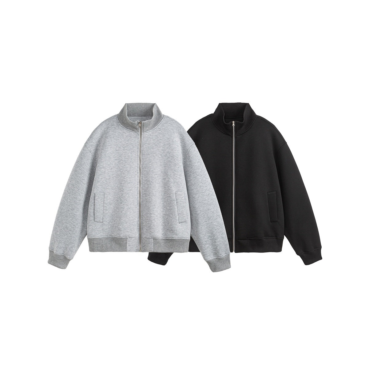 Front view of two zip-up jackets with stand collars and pockets, in heather gray and black.