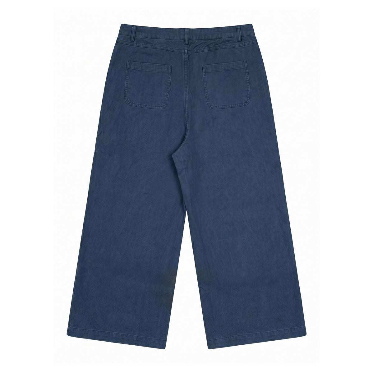 Full back view of blue wide-leg trousers with belt loops and two patch pockets, laid flat on white.