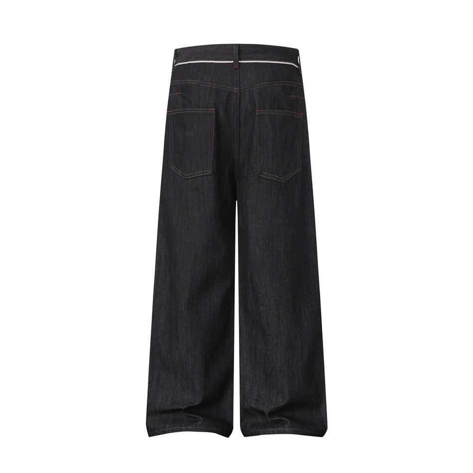Back view of black wide-leg denim jeans with two patch pockets and red stitching