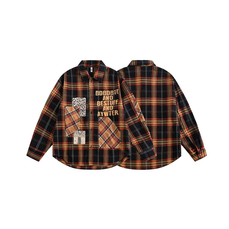 Black plaid button-front shirt shown front and back, with contrasting patchwork pockets and orange lettering on the front.