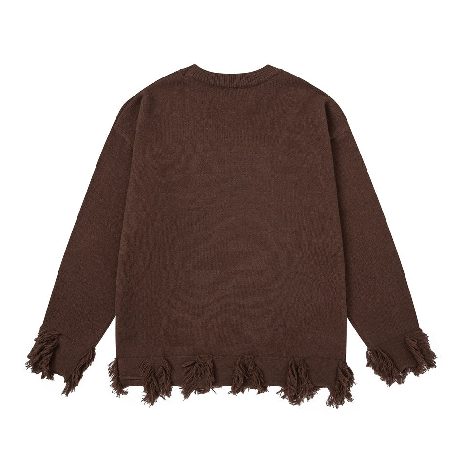 Flat view of the back of a dark brown crewneck sweater with fringe along the cuffs and hem.