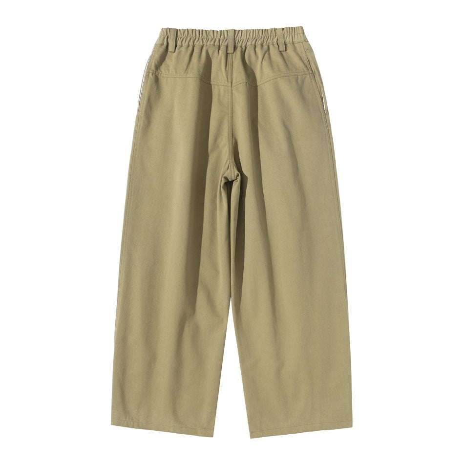 Back view of khaki wide-leg trousers with an elastic waistband and rear pockets.