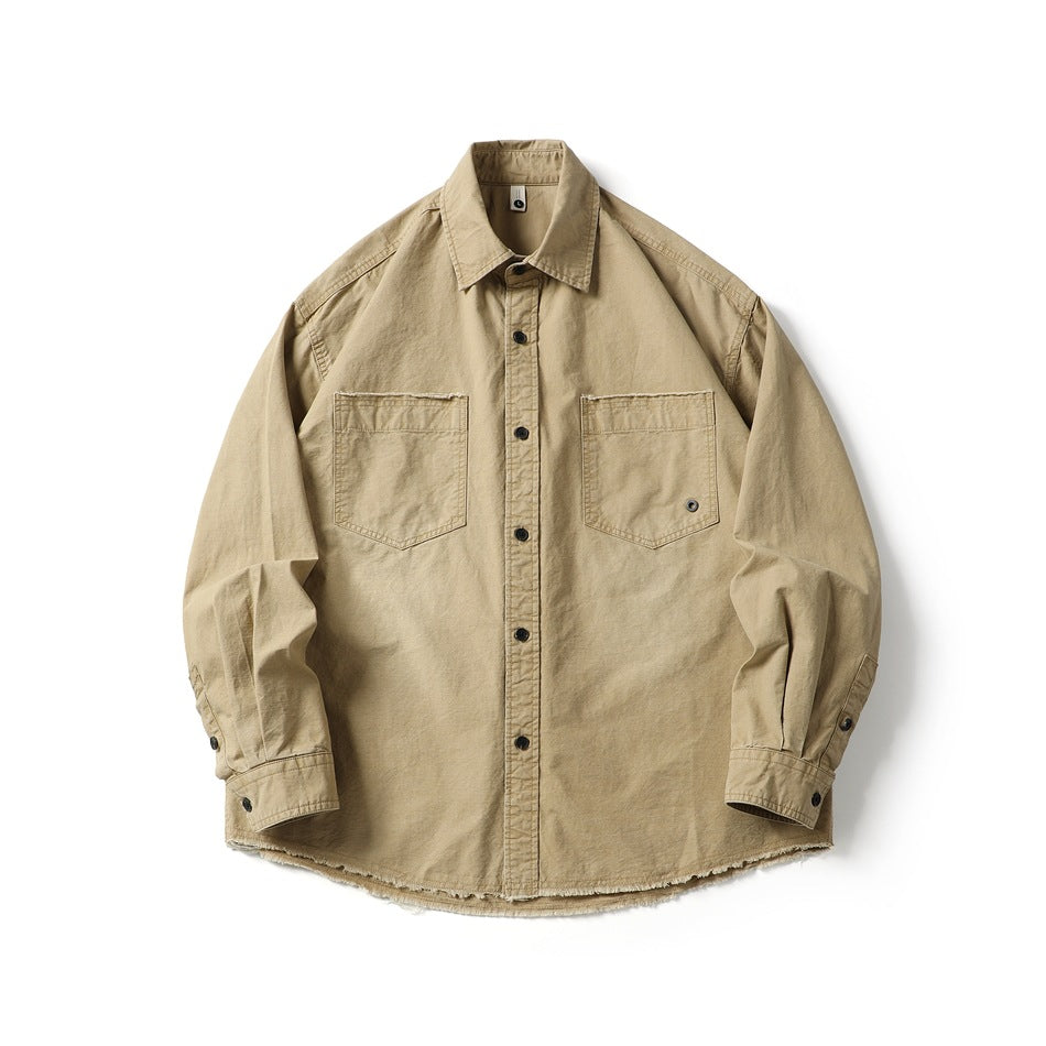 Khaki long-sleeve button-front shirt with two chest pockets and frayed raw hem, flat lay