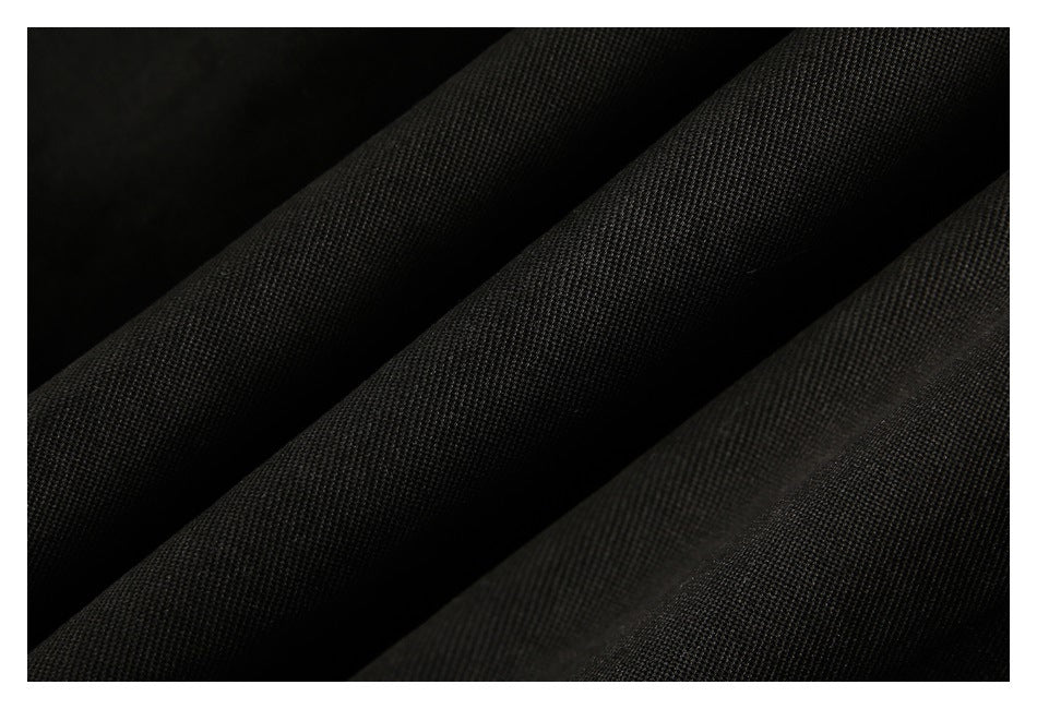 Macro view of the fine woven texture of black fabric.