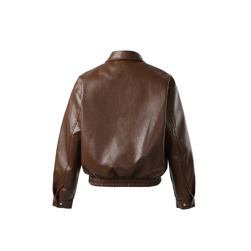 Back view of brown glossy faux-leather jacket with elastic hem and snap-tab cuffs