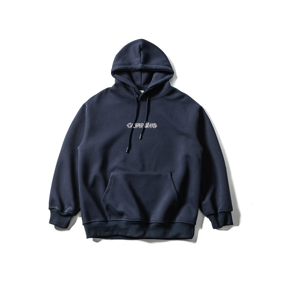 Front view of a navy pullover hoodie with drawstrings, ribbed cuffs and hem, and a kangaroo pocket.