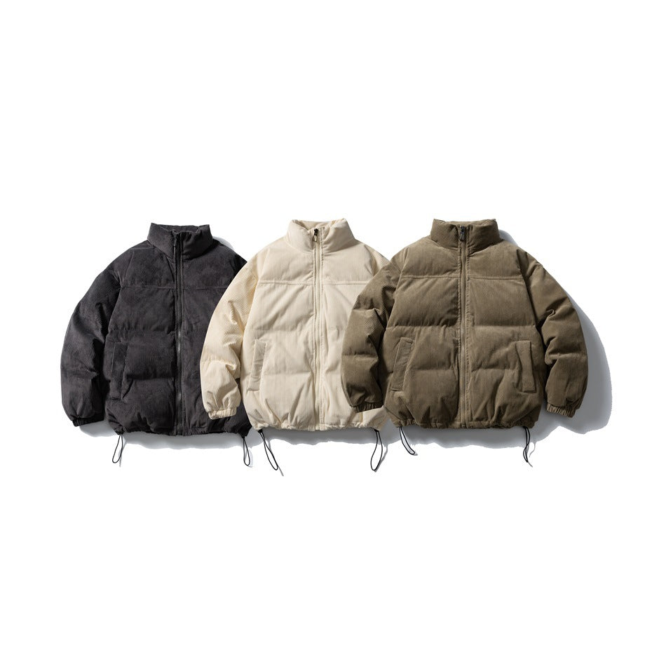 Three front-facing padded jackets with stand collars and zip fronts in black, cream and olive brown.