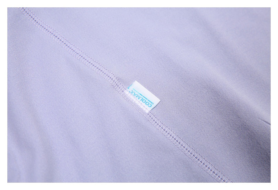Close-up of a lavender seam with a small COOLMAX label.