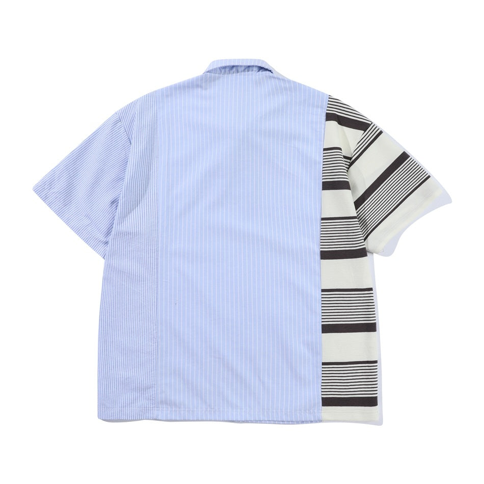 Back view of blue pinstripe short-sleeve shirt with cream and brown striped panel and sleeve on one side