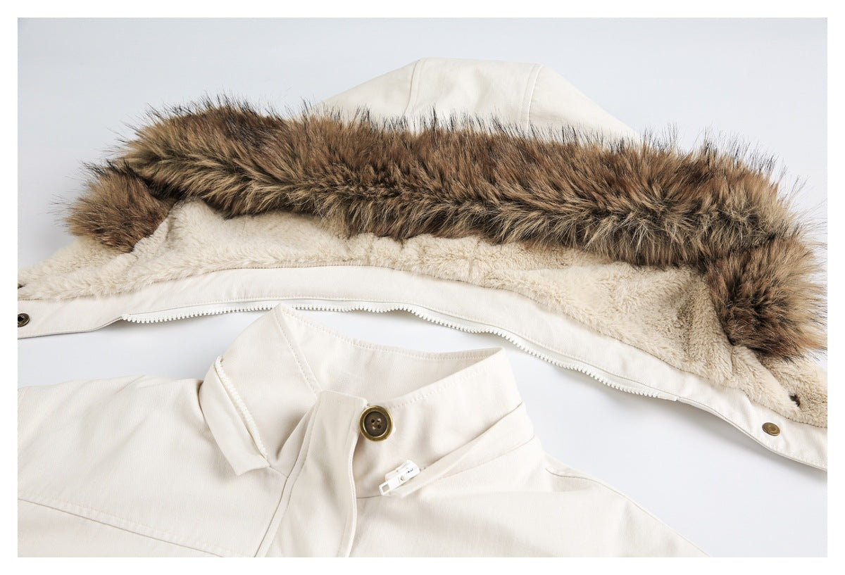 Ivory jacket shown with its brown faux-fur-trimmed hood detached, revealing the stand collar and zipper.