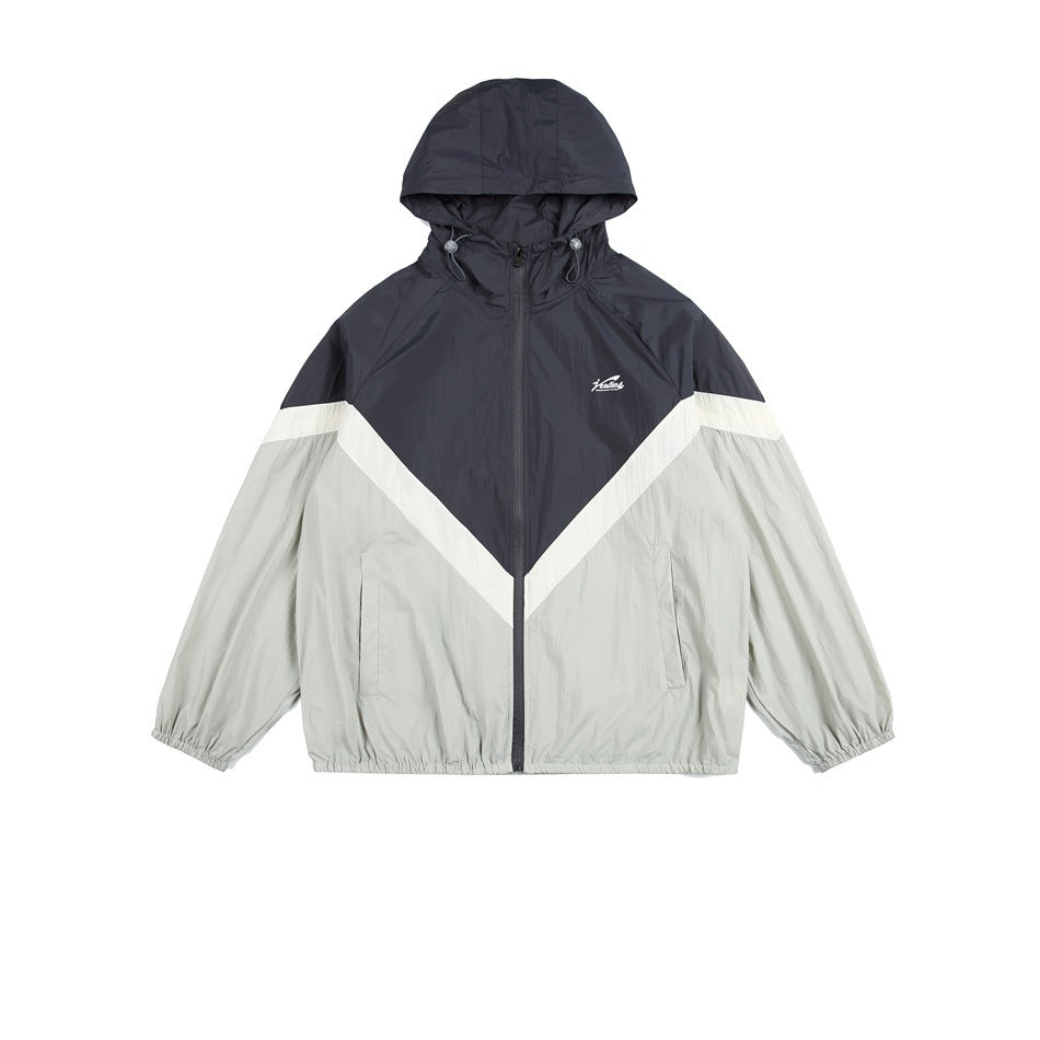 Charcoal and light gray color-block hooded zip jacket with cream chevron stripe, flat lay front view