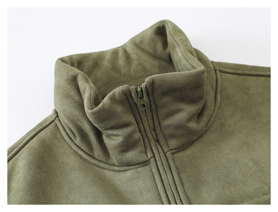 Close-up of the olive vest's raised collar and front zipper.