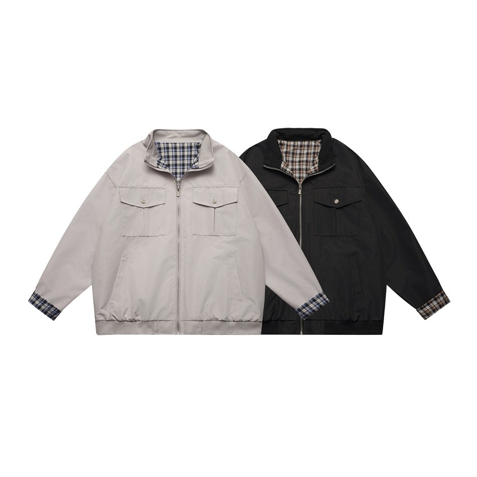 Two front-facing zip jackets shown flat: one light gray and one black, both with plaid lining and cuffs.