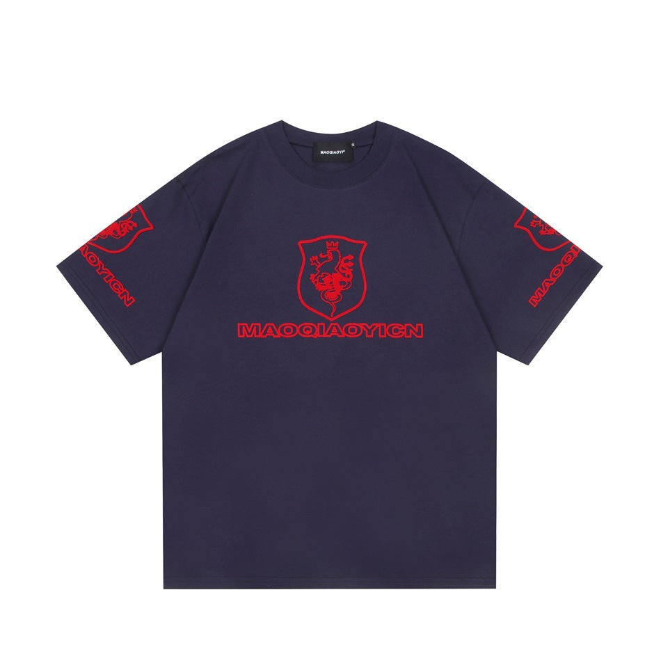 Navy blue short-sleeve crew-neck t-shirt with red lion shield crest and lettering on chest and sleeves, flat lay front