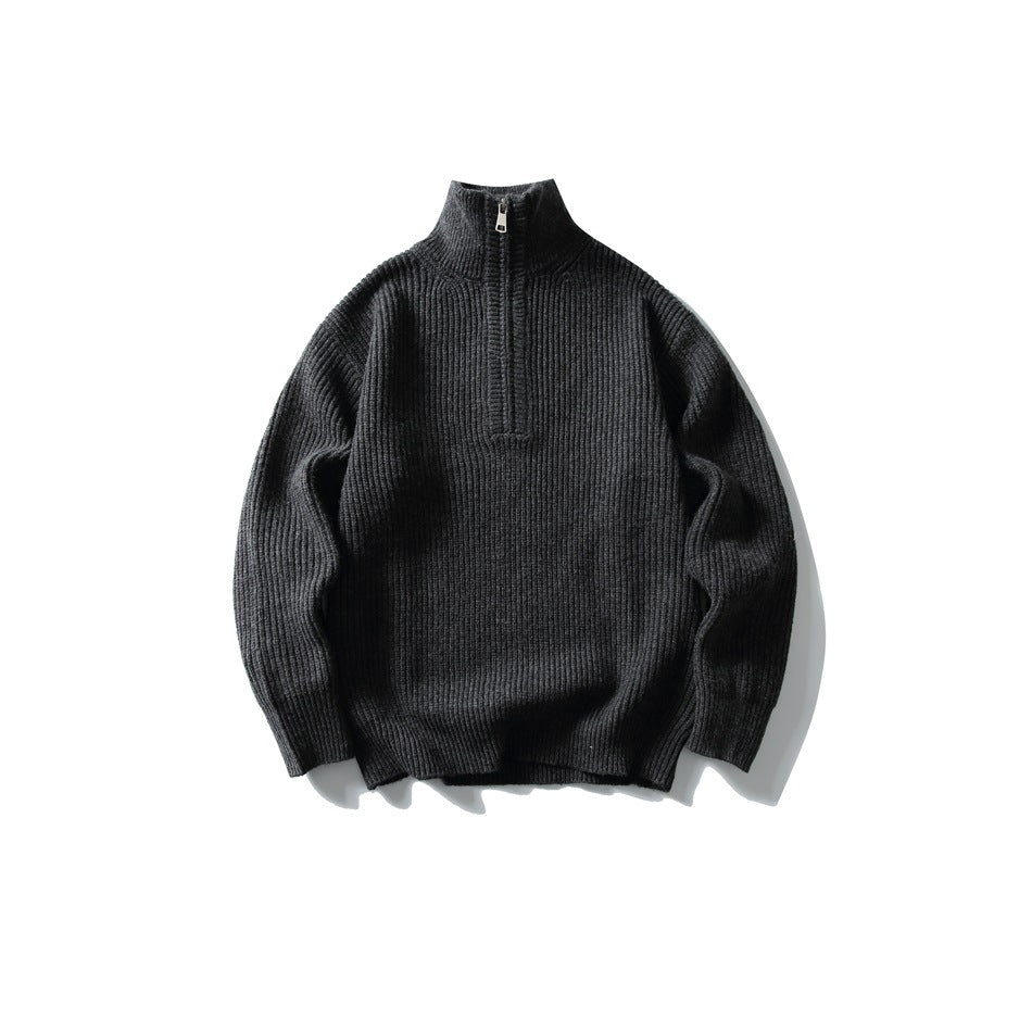 Dark gray ribbed knit half-zip sweater with stand collar, flat lay front view