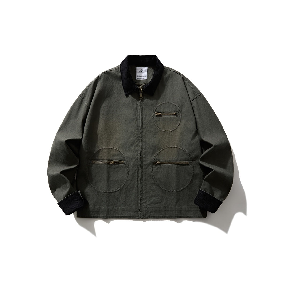 Army green washed zip jacket with black corduroy collar and cuffs and three circular zip pockets, flat front view