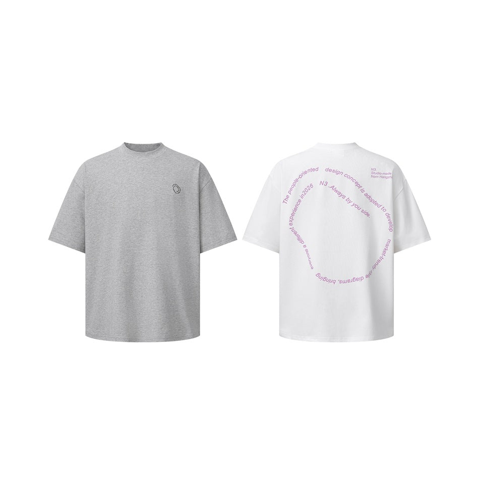 Gray T-shirt front and white T-shirt back shown side by side; the white shirt has circular pink back text.
