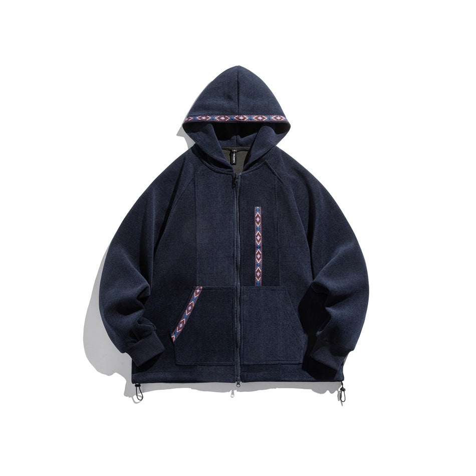 Navy blue ribbed zip-up hoodie with woven geometric trim on the hood, front panel and pocket, flat front view
