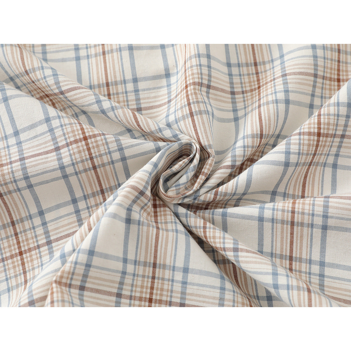 Close-up of cream fabric gathered to show its blue-gray and rust plaid pattern.