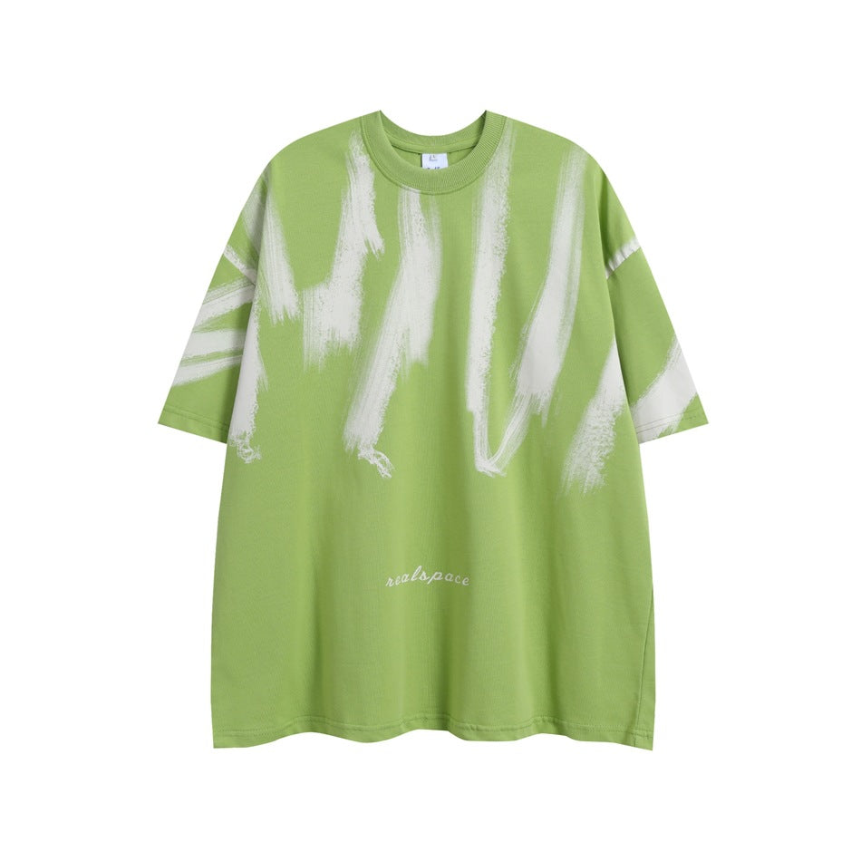 Green oversized short-sleeve T-shirt with cream brushstroke print on chest and sleeves, flat front view